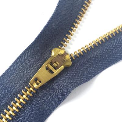 China Auto Lock Wholesale #4 YG Brass Slider Teeth Jeans Metal Zipper For Jeans for sale