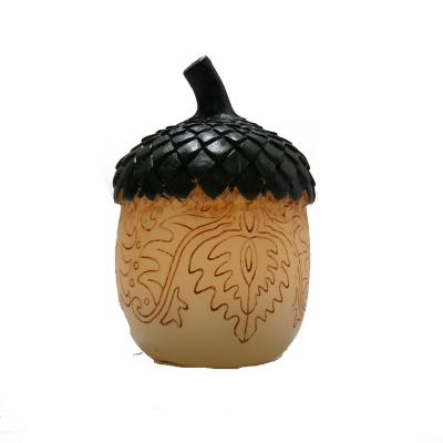 China Wholesale flameless hollowed out ceramic acron shaped tealight holder for sale