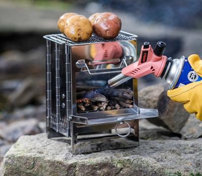 China Automatic Outdoor Portable Cooking Wood Camping Stove Windproof Folding for sale