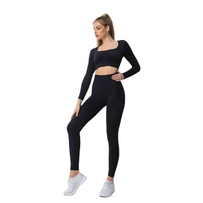 China Hot Selling Breathable Women Fitness Gym Yoga Sets Long Sleeve Fashion Hip Pants Seamless 2 Piece Yoga Sets for sale