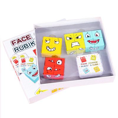 China Electronic Toy Kids Educational Toys Expression Face Changing Wooden Magic Cube Puzzle Block Toy for sale