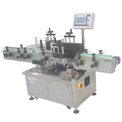 China Máquina automática de etiquetado de botellas redondas para la producción de etiquetas de botellas de bebidas en venta