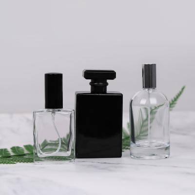 China Cosmetic Customized Shiny 100Ml Spray Bottles Tiny Perfume 30Ml Glass , Travel Perfume Bottles Glass 50Ml for sale