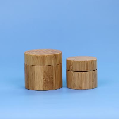 China Skincare Creams Bamboo Wooden Lids Top Cap With Frosted Glass Cosmetic Cream Jars for sale