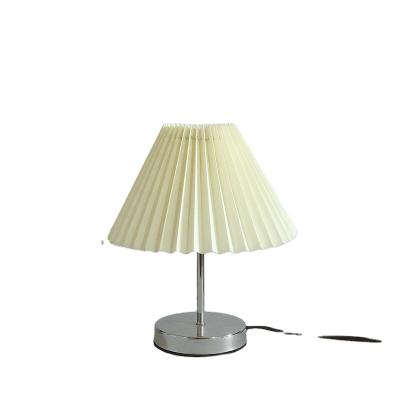 China Direct Selling Modern Simple Creative Bedroom Desk Lamp Korean Warm Romantic Led Small Pleated Night Decorative Lamp for sale