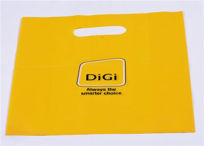 China Plastic Handle Die Cut Poly Bags Yellow Custom Printing For Gift Store for sale