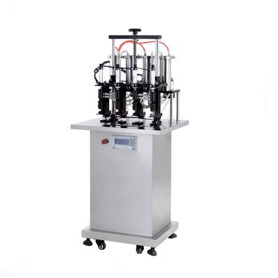 China GARMENT Semi Automatic Four Nozzles Processing Equipment Essential Oil Perfume Liquid Filling Machine for sale