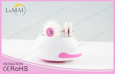 China Women Plastic Electric Mini Body Massager With Silicone Roller 301g for sale