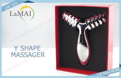 China ABS Eliminating Baby Fat Y Shape Massager With Silver Rolling Head for sale