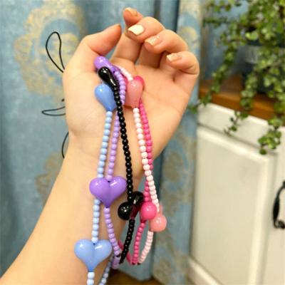 China Very Special and Practical Cute Phone Charms Gifts Shape Beaded Phone Charm, Heart Clay Beads Acrylic Phone Lanyard Wrist Strap for Women for sale