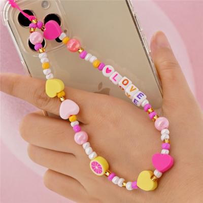 China Phone Straps Beaded Phone Charm Strap, Smiley Face Fruit Star Initial Pearl Rainbow Acrylic Cell Phone Lanyard for Phone Key Purses for sale