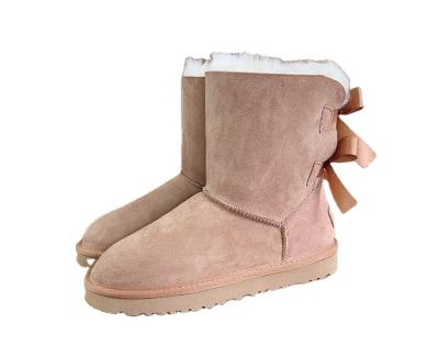 China Fashion Trend 2 Bows Winter Snow Boots Women Sheepskin Shoes Real Fur Shearing Scratching Boots for sale