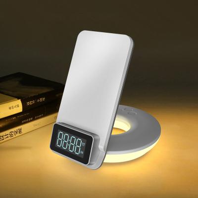 China 2022 Most Products Qi Mobile Phone Charger Multifunctional Desk Led Lamp Alarm Clock With Wireless Charging for sale