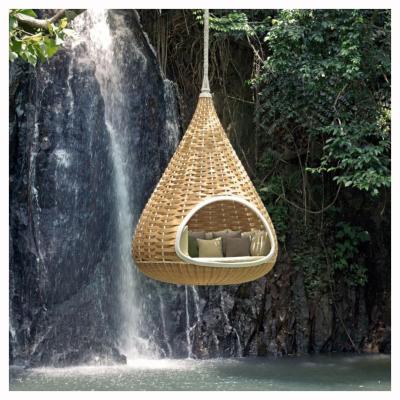 China Minimalist Cheap Outdoor Garden Wicker Round Daybed With Nestrest Hanging Canopy Swing for sale