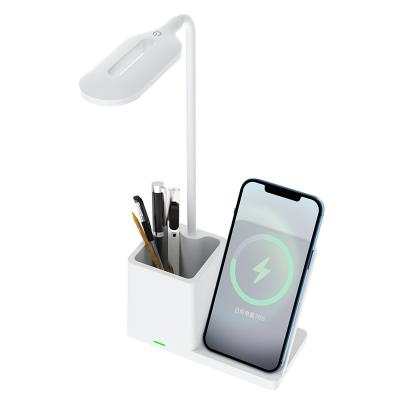 China Mobile Phone Desk LED Table Lamp with Charger Stand Pen Holder Adjustable Arm Stepless Brightness Adjustment LED Lamp Wireless for sale