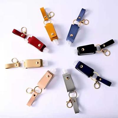 China art & Hot Selling 30ML Color PU Leather Strap Sanitizer Holder Key Chain Portable Empty Sanitizer Bottle Collectable Key Chain for sale