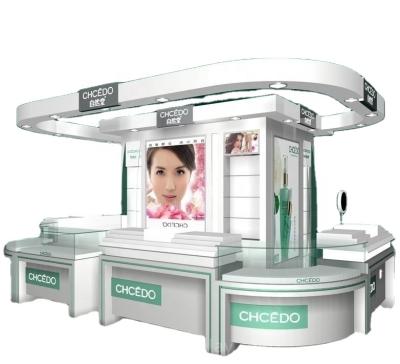 China Modern White Cosmetics Kiosk With Ceiling Customized Makeup Mall Kiosk Cosmetic Store Design And Manufacturer for sale