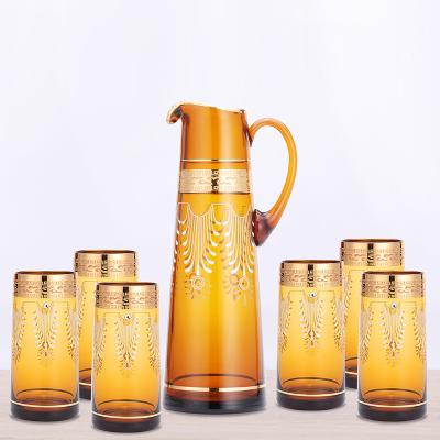 China Viable ready to ship water set with 1 pot and 6 cups water set handmade construction with real gold decoration glassware for sale