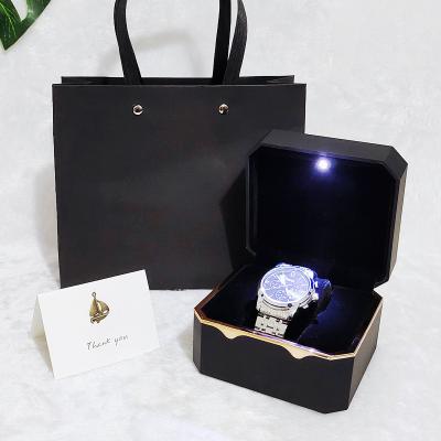 China Custom Flip Watch Box Luxury Oem Logo Square Center Seam Packing LED Light Flip Watch Box LED Light for sale