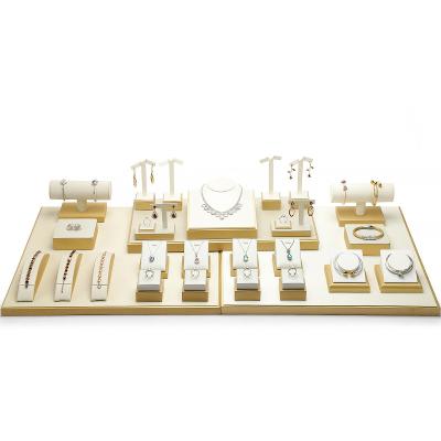 China New Recyclable Jewelry Display Set Luxury Standing Showcase Tray Beige Display Jewelry Necklace Display For Store for sale