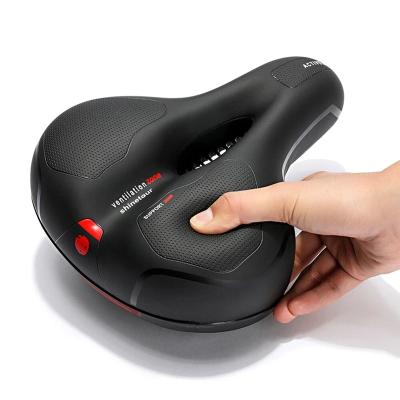 China Durable Hollow Breathable Bicycle Saddle Men Women MTB Road Bike Saddle Big Butt Shock Absorbing Comfortable Comfortable Safety Warning for sale