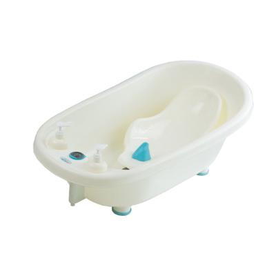 China Viable Hot Seller Cream Bathtub Baby Cream Stable Durable Plastic Bathtub Have Thermometer Laying Board for sale