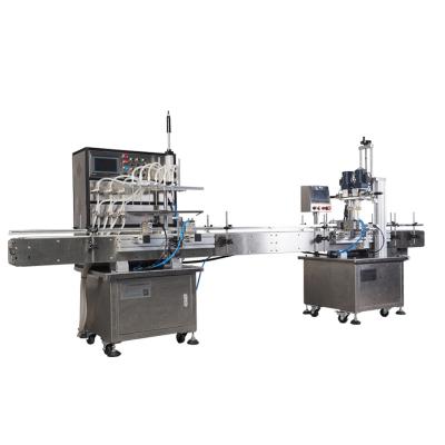 China filling & Sealing Production Line 6 Full Automatic Liquid Filling Machine Liquid Filling Oil Perfume Coffee Milk Spout Filling And Capping Machine for sale