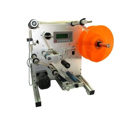 China Food Round Bottle Labeling Machine Small Horizontal Semi Automatic Round Bottle Desktop Self Adhesive Labeling Machine for sale