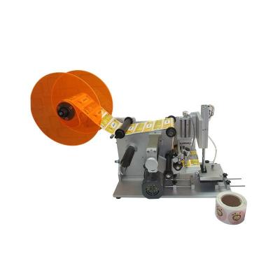 China Semi Automatic Small Square Flat Bottle Flat Bottle Self Adhesive Labeling Machine Commodities Automatic Labeling Machine for sale