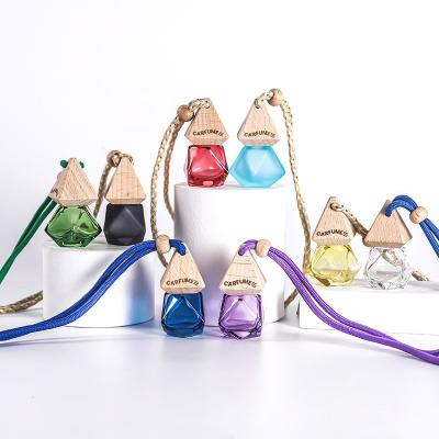 China Portable Cosmetic Glass Pendant Nail Polish Air Freshener Car Perfume Bottle Car Perfume Color Dispensing Bottles for sale