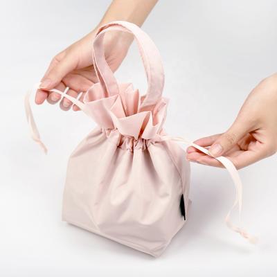 China Practical Eco Polyester Fabrics Soft All In One Travel Lazy Drawstring Makeup Cosmetic Organizer Bag With Handle for sale