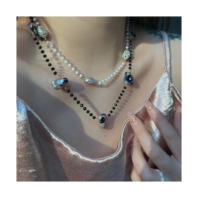 China 2022 New Designer FASHIONABLE Style Dubai Striped Pearl White Pearl Chain 18k Colorful Black Gold Plated Stainless Steel Beaded Necklace for sale