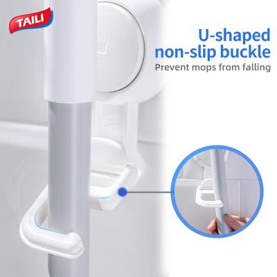 China TAILI Broom Broom Holder Fashionable Plastic Wall Mounted Removable Handle and Bromm Holder For Bathroom for sale