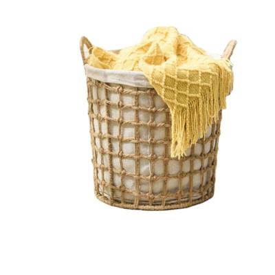 China Sustainable Amazon Rattan Round Basket Household Dirty Clothes Toy Storage Basket for sale