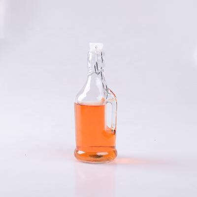 China Premium Beverage Jars Empty Syrup Glass Bottles For Canning With Airthght Clear Glass Swing Top Lid Sauce Bottle for sale