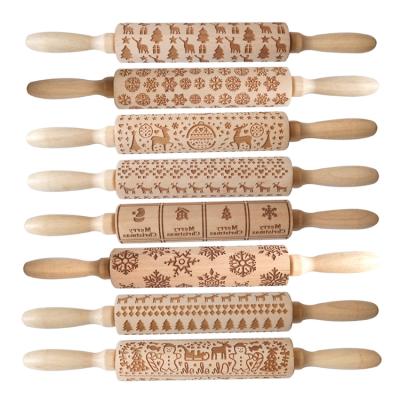 China Sustainable Wholesale Custom Cookies Dough Roller Baking Beech Embossed Rolling Pin Wooden for sale