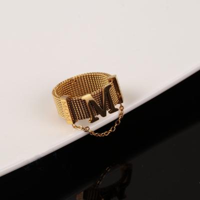 China CLASSIC Wide M Letter Stainless Steel Ring 18K Gold Plated Exaggerated M Letter Hip Hop Ring With Tassel for sale