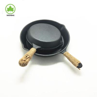 China Eco - Friendly Cast Iron Cookware Skillet / Frying Pan With Hemp Rope Handle for sale