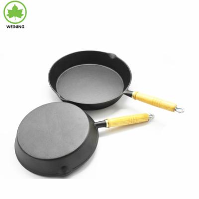 China Sustainable BBQ Stove Cast Iron Grill Pan Wood Handle for sale