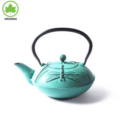 China Sustainable cast iron teapot with dragonfly for sale