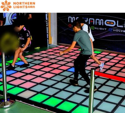 Cina Interattivo gioco a griglia a LED Arena per bambini sul pavimento di metallo nel parco del trampolino Playhouse in vendita