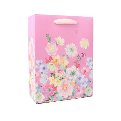 China Recyclable Custom Printed Birthday Gift Wrapping Bag Kraft Paper Exquisite Gift Bag for sale