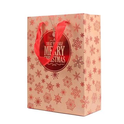 China New Design Recyclable Paper Bag Portable Holiday Christmas Gift Bag for sale