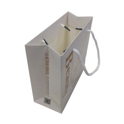 China Handmade Shopping Design Boutique Shop Nice Clothing Packaging Paper Bag for sale