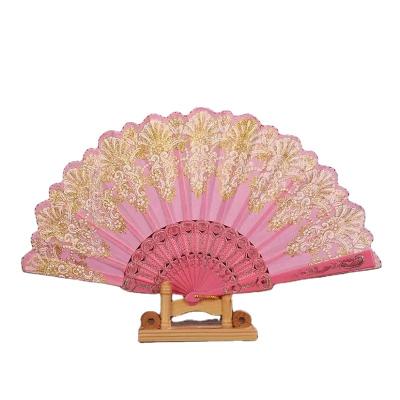 China Factory wholesale gold handheld plastic craft fan Chinese style retro fabric folding fan gift Chinese wedding portable handwork for sale