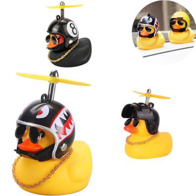 China Car Eco-friendly Material Duck With Broken Helmet Wind Duck Road Bike Motor Helmet Car Accessories Small Yellow Mount Recycling Decor for sale