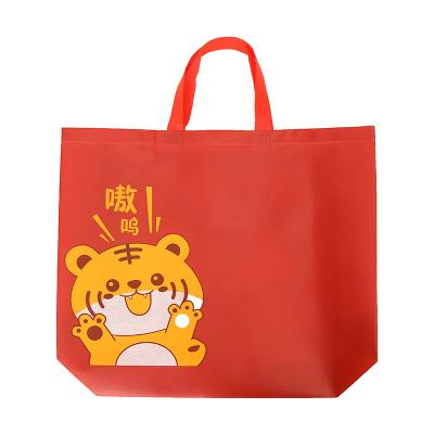 China Tiger Red Clothing Store Gift Bag Single Handled Waterproof Non-woven Lady Handbag Lady's Clothing Store Shopping Bag for sale