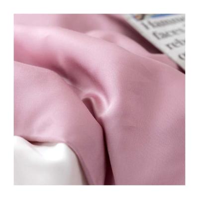 China Polyester Anti-static Material Ice Silk Fabric Smooth Solid Summer Lady Clothing Fabric for sale