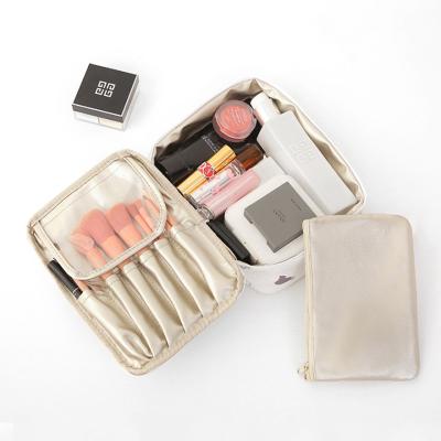 China Wholesale Hot Sale Large Capacity Ladies Travel Cosmetic Organizer Pink Bag For Makeup Brush For Bottles for sale