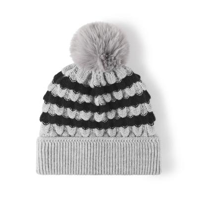 China COMMON Fashionable cold weather accessory faux fur pompom beanie hat with lining for sale